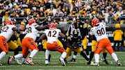 Bengals defense rushes the ball carrier during their game against the Steelers on Sunday November 16, 2025 at Acrisure Stadium.