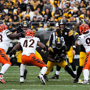 Bengals defense rushes the ball carrier during their game against the Steelers on Sunday November 16, 2025 at Acrisure Stadium.