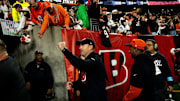 Cincinnati Bengals head coach Zac Taylor raises his fist while leaving the field after the NFL game at Paycor Stadium in Cincinnati on Saturday, Dec. 28, 2024. Cincinnati Bengals defeated Denver Broncos 30-24 in overtime.