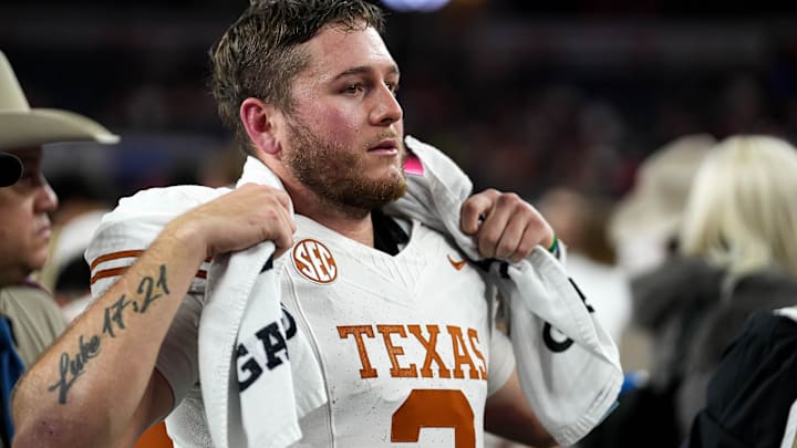 Texas Longhorns quarterback Quinn Ewers (3) looks into the crowd after the 28-14 loss to Ohio State in the College Football Playoff semifinal game in the Cotton Bowl at AT&T Stadium on Friday, Jan. 10, 2024 in Arlington, Texas.