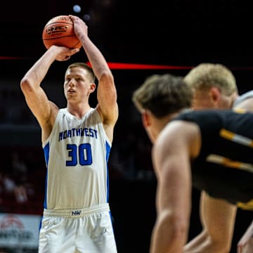 Waukee Northwest's Landon Davis (30) shoots a free throw on Monday, March 10, 2025, at Wells Fargo Arena in Des Moines.