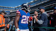 New York Giants running back Devin Singletary (26) fist bumps a fan during a week 9 game between New York Giants and San Francisco 49ers at MetLife Stadium on Sunday, Nov. 2, 2025.