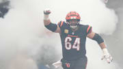 Bengals Ted Karras (64) enter the field before their game against the Bears at Paycor Stadium on Sunday November 2, 2025.