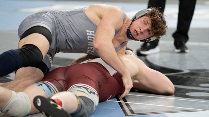 Howell’s Tanner Hodgins wrestles Morristown’s Henry Saxon at the NJSIAA state championship tournament at Boardwalk Hall in Atlantic City on March 6, 2025.