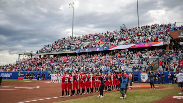 Teams stand for the Nation Anthem before game 3 between Texas Tech and Ole Miss at the Women’s College World Series at Devon Park in Oklahoma City, on Thursday, May 29, 2025.