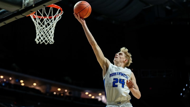 Waukee Northwest's Colin Rice (24) scores off a layup against Cedar Rapids Kennedy on Monday, March 10, 2025, at Wells Fargo Arena in Des Moines. Waukee Northwest's Colin Rice (24) scores off a layup against Cedar Rapids Kennedy on Monday, March 10, 2025, at Wells Fargo Arena in Des Moines.