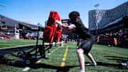 Cincinnati Bearcats linebacker Jake Golday (11) hits a pad during the Cincinnati Bearcats football spring practice at Nippert Stadium on Saturday, April 12, 2025.