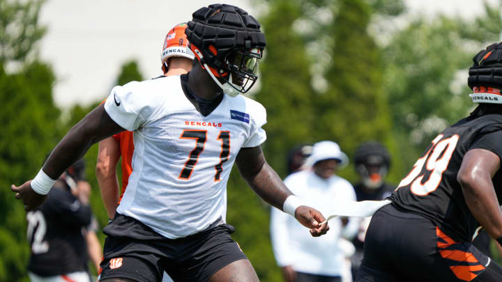 Bengals Amarius Mims defends during the second day of Bengals training camp on Thursday July 25, 2024.