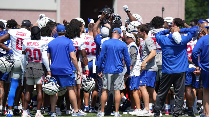 Jul 26, 2024; East Rutherford, NJ, USA; New York Giants players huddle at the end of training camp at Quest Diagnostics Training Center. Mandatory Credit: Lucas Boland-USA TODAY Sports