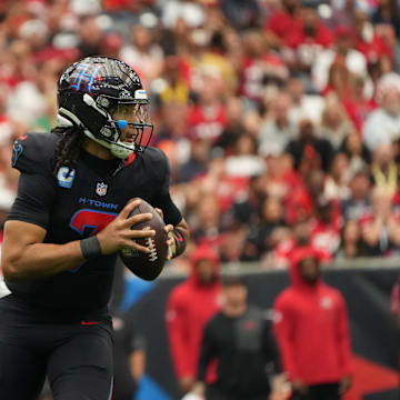 Oct 26, 2025; Houston, Texas, USA; Houston Texans quarterback C.J. Stroud (7) runs in the pocket during the second half against the San Francisco 49ers at NRG Stadium. Mandatory Credit: Sean Thomas-Imagn Images