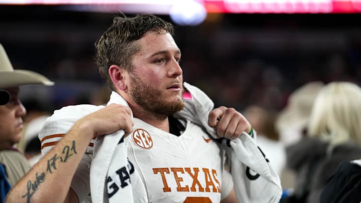 Texas Longhorns quarterback Quinn Ewers (3) looks into the crowd after the 28-14 loss to Ohio State in the College Football Playoff semifinal game in the Cotton Bowl at AT&T Stadium on Friday, Jan. 10, 2024 in Arlington, Texas. Texas Longhorns quarterback Quinn Ewers (3) looks into the crowd after the 28-14 loss to Ohio State in the College Football Playoff semifinal game in the Cotton Bowl at AT&T Stadium on Friday, Jan. 10, 2024 in Arlington, Texas.