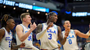 Mar 20, 2025; Lexington, KY, USA;  UCLA Bruins guard Eric Dailey Jr. (3) reacts during the second half against the Utah State Aggies in the first round of the NCAA Tournament at Rupp Arena. Mandatory Credit: Aaron Doster-Imagn Images