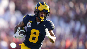 Jan 1, 2024; Pasadena, CA, USA; Michigan Wolverines wide receiver Tyler Morris (8) runs with the ball during the first half against the Alabama Crimson Tide in the 2024 Rose Bowl college football playoff semifinal game at Rose Bowl.