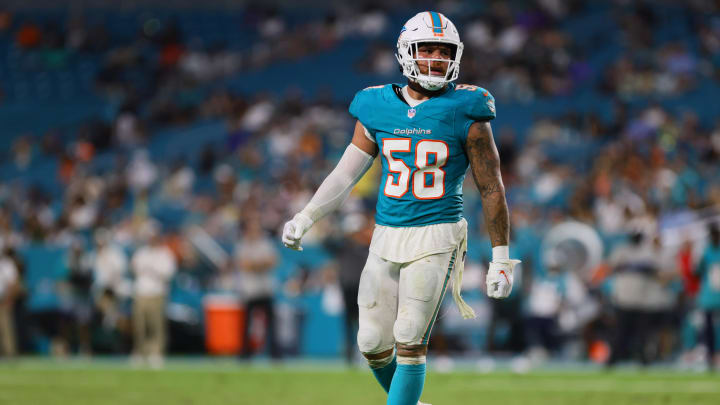 Aug 9, 2024; Miami Gardens, Florida, USA; Miami Dolphins linebacker Curtis Bolton (58) looks on against the Atlanta Falcons during the fourth quarter at Hard Rock Stadium.