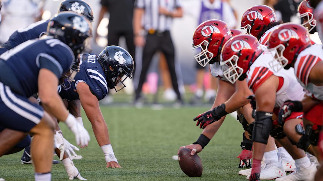 Sep 14, 2024; Logan, Utah, USA;  The Utah State Aggies play against the Utah Utes at Merlin Olsen Field at Maverik Stadium. Mandatory Credit: Jamie Sabau-Imagn Images