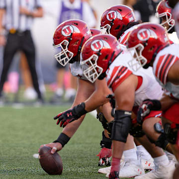 Sep 14, 2024; Logan, Utah, USA;  The Utah State Aggies play against the Utah Utes at Merlin Olsen Field at Maverik Stadium. Mandatory Credit: Jamie Sabau-Imagn Images