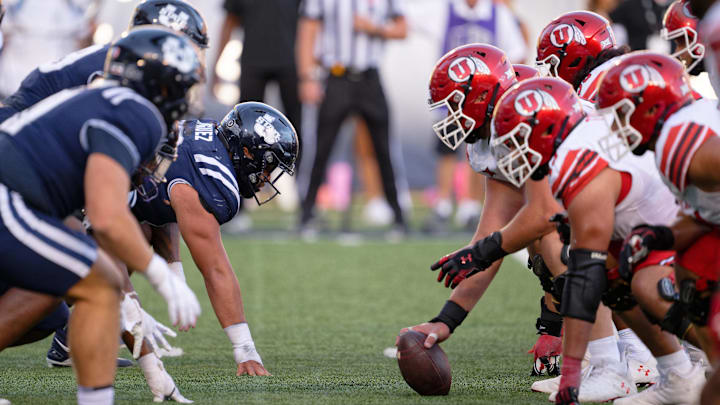 Sep 14, 2024; Logan, Utah, USA;  The Utah State Aggies play against the Utah Utes at Merlin Olsen Field at Maverik Stadium. Mandatory Credit: Jamie Sabau-Imagn Images