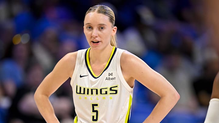 May 19, 2025; Arlington, Texas, USA;  Dallas Wings guard Paige Bueckers (5) in action during the game between the Dallas Wings and the Seattle Storm at College Park Center. Mandatory Credit: Jerome Miron-Imagn Images