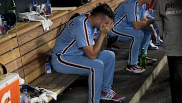 Oct 9, 2025; Los Angeles, California, USA; Philadelphia Phillies pitcher Orion Kerkering (50) in the dugout after the final out as they lost to the Los Angeles Dodgers in game four of the NLDS during the 2025 MLB playoffs at Dodger Stadium.
