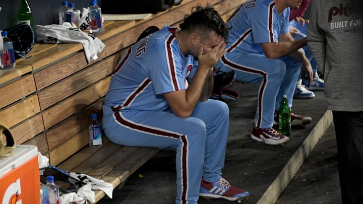 Oct 9, 2025; Los Angeles, California, USA; Philadelphia Phillies pitcher Orion Kerkering (50) in the dugout after the final out as they lost to the Los Angeles Dodgers in game four of the NLDS during the 2025 MLB playoffs at Dodger Stadium.