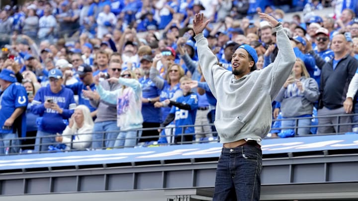 Sep 8, 2024; Indianapolis, Indiana, USA; Indiana Pacers point guard Tyrese Haliburton cheers Sunday, Sept. 8, 2024, during a game between the Indianapolis Colts and the Houston Texans at Lucas Oil Stadium. Mandatory Credit: Grace Hollars/USA TODAY Network via Imagn Images