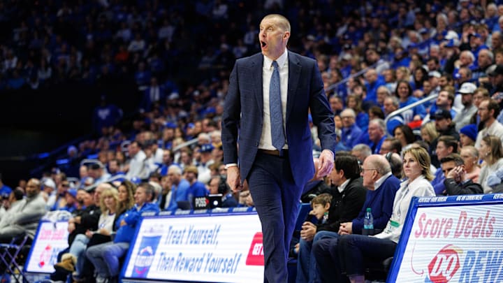 Jan 4, 2025; Lexington, Kentucky, USA; Kentucky Wildcats head coach Mark Pope yells to his players during the first half against the Florida Gators at Rupp Arena at Central Bank Center. Mandatory Credit: Jordan Prather-Imagn Images Jan 4, 2025; Lexington, Kentucky, USA; Kentucky Wildcats head coach Mark Pope yells to his players during the first half against the Florida Gators at Rupp Arena at Central Bank Center. Mandatory Credit: Jordan Prather-Imagn Images