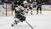 Nov 7, 2024; San Jose, California, USA;  Minnesota Wild left wing Kirill Kaprizov (97) chase after the puck during the first period against the San Jose Sharks at SAP Center at San Jose. Mandatory Credit: Stan Szeto-Imagn Images