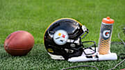 Aug 16, 2025; Pittsburgh, Pennsylvania, USA; A Pittsburgh Steelers helmet sits on the turf against the Tampa Bay Buccaneers during the first quarter at Acrisure Stadium. Mandatory Credit: Barry Reeger-Imagn Images