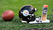 Aug 16, 2025; Pittsburgh, Pennsylvania, USA; A Pittsburgh Steelers helmet sits on the turf against the Tampa Bay Buccaneers during the first quarter at Acrisure Stadium. Mandatory Credit: Barry Reeger-Imagn Images