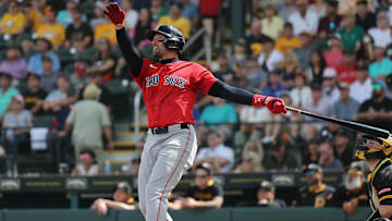 Mar 4, 2025; Bradenton, Florida, USA;  Boston Red Sox center fielder Trayce Thompson (37) hits a 2-run home run during the third inning against the Pittsburgh Pirates at LECOM Park. Mandatory Credit: Kim Klement Neitzel-Imagn Images