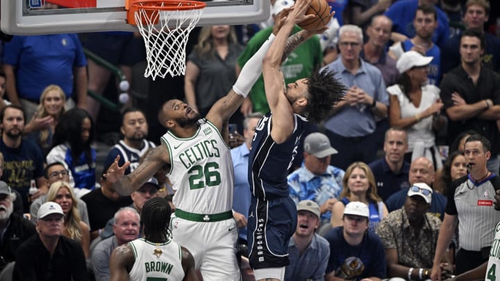 Jun 12, 2024; Dallas, Texas, USA; Dallas Mavericks center Dereck Lively II (2) shoots against Boston Celtics forward Xavier Tillman (26) during the first quarter in game three of the 2024 NBA Finals at American Airlines Center. Mandatory Credit: Jerome Miron-USA TODAY Sports