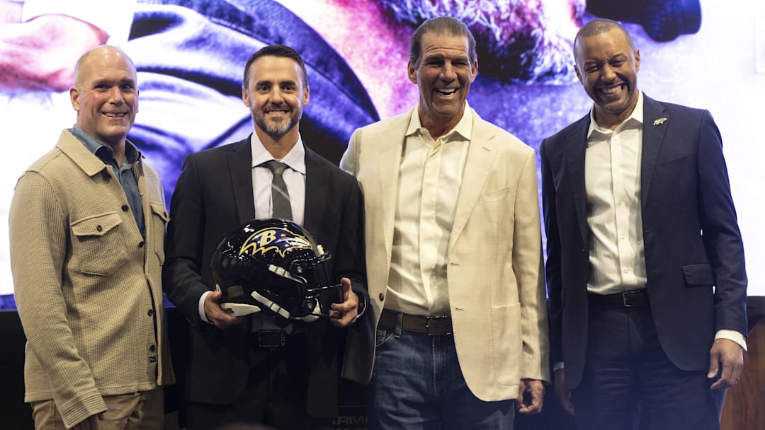 Jan 29, 2026; Owings Mills, MD, USA; Eric DeCosta, Jesse Minter, Steve Bisciotti, Sashi Brown photo prior to press conference at Under Armour Performance Center. Mandatory Credit: Lexi Thompson-Imagn Images