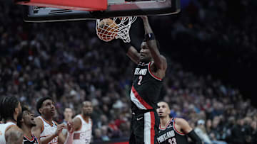 Feb 1, 2025; Portland, Oregon, USA; Portland Trail Blazers center Deandre Ayton (2) dunks the ball during the second half against the Phoenix Suns at Moda Center. Mandatory Credit: Soobum Im-Imagn Images