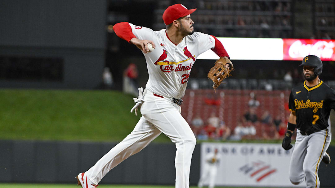 Sep 18, 2024; St. Louis, Missouri, USA;  St. Louis Cardinals third baseman Nolan Arenado (28) forces out Pittsburgh Pirates shortstop Isiah Kiner-Falefa (7) and throws to first to complete the double play to end the third inning at Busch Stadium. Mandatory Credit: Jeff Curry-Imagn Images
