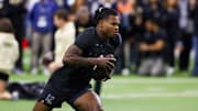 Apr 4, 2025; Boulder, CO, USA; Colorado Buffaloes wide receiver Travis Hunter (12) runs drills at the University of Colorado NFL Showcase at the CU Indoor Practice Facility. Mandatory Credit: Michael Ciaglo-Imagn Images