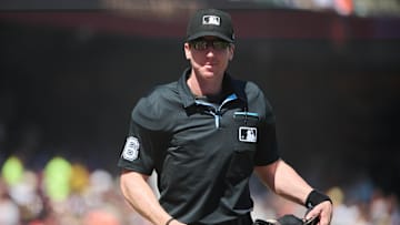 Aug 26, 2023; San Francisco, California, USA; Home plate umpire Alex Tosi (66) smiles before the start of the seventh inning of the game between the Atlanta Braves and the San Francisco Giants at Oracle Park.