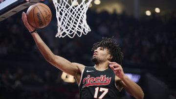 Nov 22, 2023; Portland, Oregon, USA; Portland Trail Blazers guard Shaedon Sharpe (17) grabs a defensive rebound during the first half against the Utah Jazz at Moda Center. Mandatory Credit: Troy Wayrynen-USA TODAY Sports