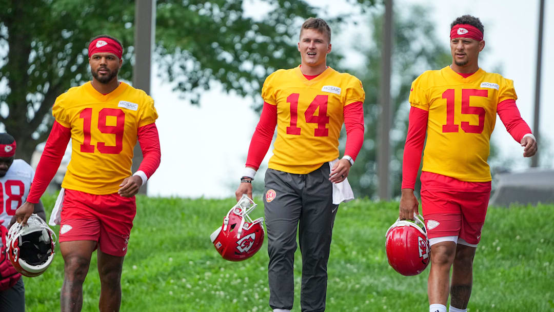 Jul 22, 2025; St. Joseph, MO, USA; Kansas City Chiefs quarterbacks Chris Oladokun (19) and quarterback Bailey Zappe (14) and Patrick Mahomes (15) walk down the hill to the practice fields during training camp at Missouri Western State University. Mandatory Credit: Denny Medley-Imagn Images
