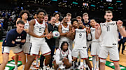 Nov 15, 2025; Boston, Massachusetts, USA; The UConn Huskies pose for a photo after a game against the BYU Cougars at TD Garden. Mandatory Credit: Eric Canha-Imagn Images