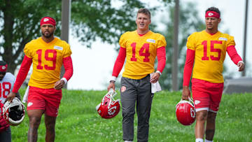 Jul 22, 2025; St. Joseph, MO, USA; Kansas City Chiefs quarterbacks Chris Oladokun (19) and quarterback Bailey Zappe (14) and Patrick Mahomes (15) walk down the hill to the practice fields during training camp at Missouri Western State University. Mandatory Credit: Denny Medley-Imagn Images