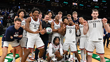 Nov 15, 2025; Boston, Massachusetts, USA; The UConn Huskies pose for a photo after a game against the BYU Cougars at TD Garden. Mandatory Credit: Eric Canha-Imagn Images