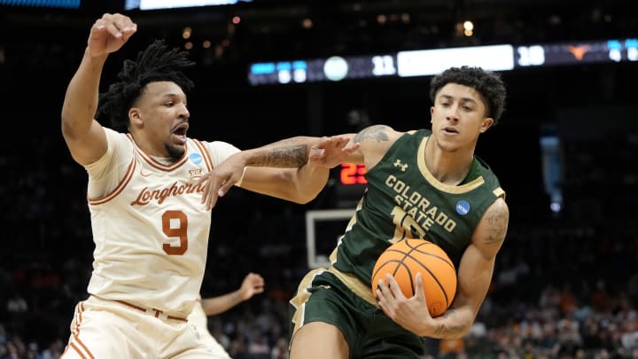 Mar 21, 2024; Charlotte, NC, USA; Texas Longhorns guard Ithiel Horton (9) defends Colorado State Rams guard Nique Clifford (10) in the first round of the 2024 NCAA Tournament at Spectrum Center. Mandatory Credit: Bob Donnan-USA TODAY Sports