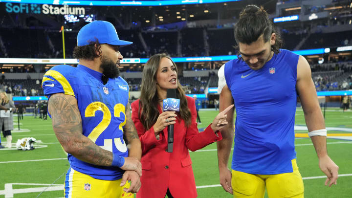 Dec 21, 2023; Inglewood, California, USA; Amazon Prime Thursday Night Football sideline reporter Kaylee Hartung (center) interviews Los Angeles Rams running back Kyren Williams (23) and wide receiver Puka Nacua after the game against the New Orleans Saints at SoFi Stadium. Mandatory Credit: Kirby Lee-USA TODAY Sports