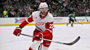 Jan 19, 2025; Dallas, Texas, USA; Detroit Red Wings center Michael Rasmussen (27) chases the puck in the Dallas Stars zone during the first period at the American Airlines Center. Mandatory Credit: Jerome Miron-Imagn Images
