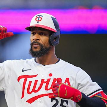Jun 25, 2025; Minneapolis, Minnesota, USA; Minnesota Twins outfielder Byron Buxton (25) celebrates his single against the Seattle Mariners in the sixth inning at Target Field. Mandatory Credit: Brad Rempel-Imagn Images