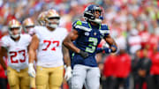 Sep 7, 2025; Seattle, Washington, USA; Seattle Seahawks safety Nick Emmanwori (3) celebrates after a play during the first half against San Francisco 49ers at Lumen Field. Mandatory Credit: Steven Bisig-Imagn Images