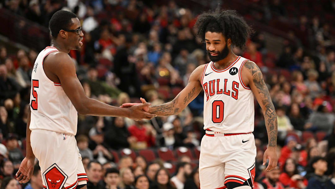 Jan 18, 2026; Chicago, Illinois, USA; Chicago Bulls guard Coby White (0) celebrates with forward Jalen Smith (25) against the Brooklyn Nets during the first half at United Center. Mandatory Credit: Patrick Gorski-Imagn Images