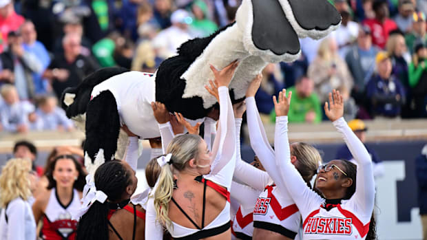 Northern Illinois cheerleaders celebrate an NIU score against Notre Dame