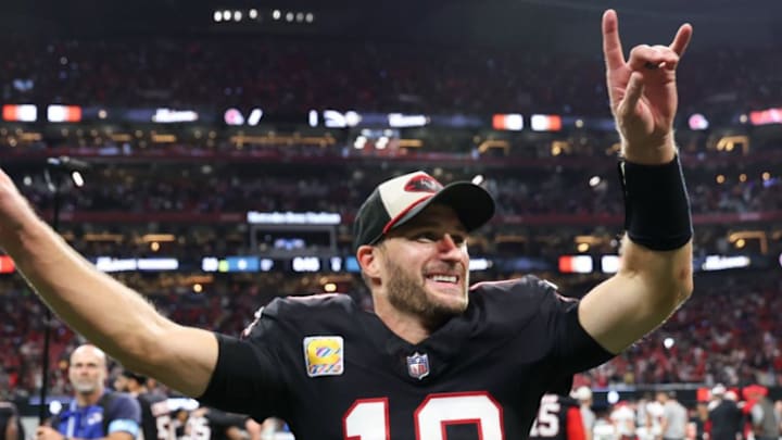 Atlanta Falcons quarterback Kirk Cousins celebrates on the field following the club's 36-30 win over the Tampa Bay Buccaneers at Mercedes-Benz Stadium on Thursday night. Atlanta Falcons quarterback Kirk Cousins celebrates on the field following the club's 36-30 win over the Tampa Bay Buccaneers at Mercedes-Benz Stadium on Thursday night.