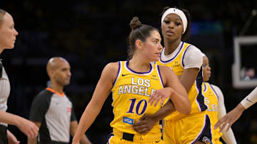 Jun 29, 2025; Los Angeles, California, USA; Los Angeles Sparks forward Rickea Jackson (2) holds back guard Kelsey Plum (10) after tempers flared in the second half against the Chicago Sky at Crypto.com Arena. Mandatory Credit: Jayne Kamin-Oncea-Imagn Images